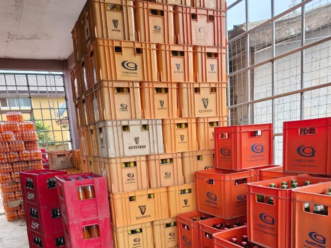 Crates of Guinness, beer and minerals stacked at the Francellen store room